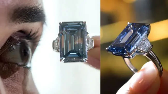 Nhân viên của Christie's đang xem viên kim cương Oppenheimer Blue 14,62 carat.