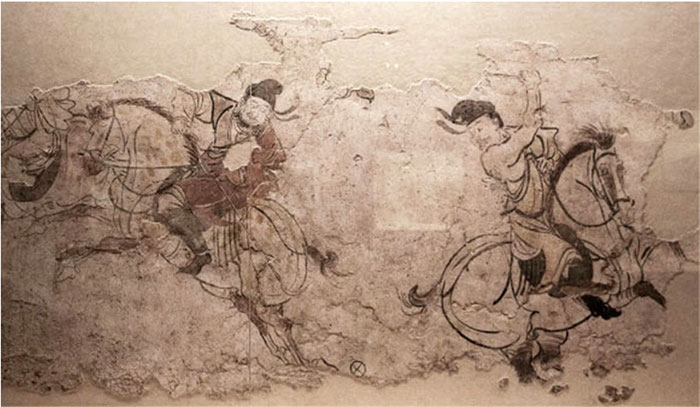 Một bức tranh tường mô tả trò chơi cưỡi ngựa đánh bóng được tìm thấy trong mộ cổ
